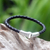 Leather braided bracelet, 'Pulse' - Sterling Silver and Braided Leather Bracelet thumbail