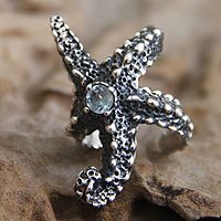 Blue topaz wrap ring, 'Balinese Starfish' - Animal-Themed Sterling Silver and Blue Topaz Ring