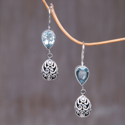 Blue topaz dangle earrings, 'Lotus Bud' - Hand Crafted Sterling Silver and Blue Topaz Earrings