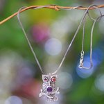 Garnet and amethyst pendant necklace, 'Wise Owl' - Sterling Silver and Amethyst Pendant Necklace