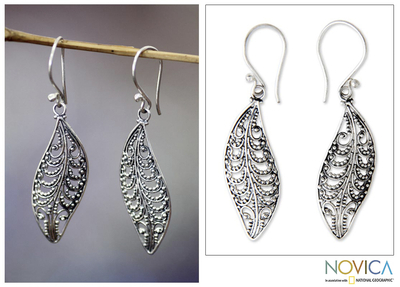 Sterling silver dangle earrings, 'Plumeria leaf' - Unique Sterling Silver Dangle Earrings