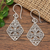 Sterling silver dangle earrings, 'Four Petals' - Floral Sterling Silver Dangle Earrings