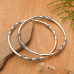 Sterling silver bangle bracelets, 'Secrets' (pair) - Artisan Crafted Sterling Silver Bangle Bracelets (Pair)
