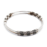 Sterling silver bangle bracelets, 'Secrets' (pair) - Artisan Crafted Sterling Silver Bangle Bracelets (Pair)