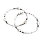 Sterling silver bangle bracelets, 'Ubud Moons' (pair) - Sterling Silver Bangle Bracelets from Indonesia (Pair)