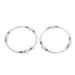 Sterling silver bangle bracelets, 'Ubud Moons' (pair) - Sterling Silver Bangle Bracelets from Indonesia (Pair)