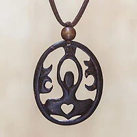 Coconut shell pendant necklace, 'Sukhasana Yoga'