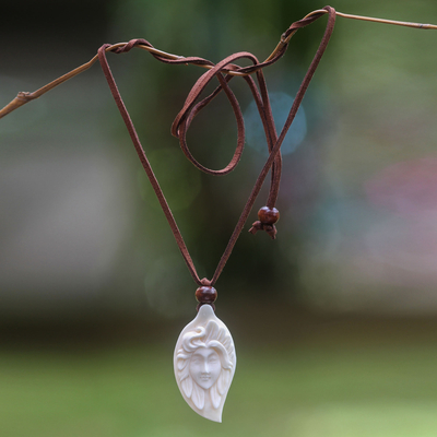 Wood and bone pendant necklace, 'Serene Beauty' - Artisan Crafted Wood and Bone Pendant Necklace