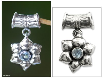 Blue topaz pendant, 'Narcissus of December' - Floral Sterling Silver and Blue Topaz Pendant