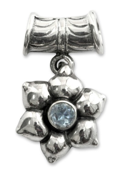 Blue topaz pendant, 'Narcissus of December' - Floral Sterling Silver and Blue Topaz Pendant