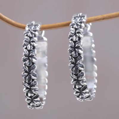 Sterling silver hoop earrings, 'Frangipani Garland' - Artisan Crafted Intricate Floral Silver Hoop Earrings