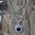 Onyx flower necklace, 'Frangipani Secrets' - Floral Sterling Silver and Onyx Pendant Necklace  (image 2) thumbail