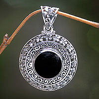 Onyx flower pendant, 'Frangipani Secrets' - Sterling Silver and Onyx Floral Medallion Pendant from Bali