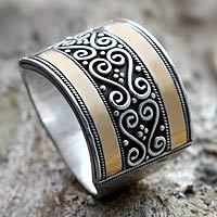 Gold accented sterling silver band ring, 'Celuk Gates' - Silver and Gold-plated Ring