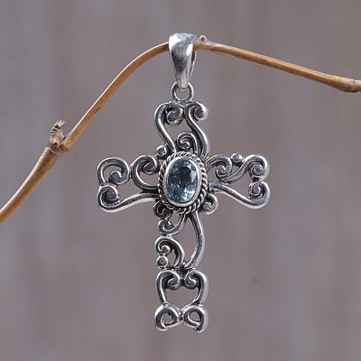Blue topaz cross pendant, 'Balinese Cross' - Fair Trade Sterling Silver and Blue Topaz Pendant