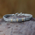 Sterling silver bracelet, 'Puri Naga' - Handcrafted Gold Accent and Sterling Silver Bracelet thumbail