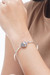 Sterling silver bangle bracelet, 'Lunar Orbit' - Hand Crafted Sterling Silver and 18k Gold Plated Bangle