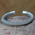 Sterling silver cuff bracelet, 'Interwoven' - Handmade Sterling Silver Cuff Bracelet thumbail
