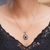 Garnet pendant necklace, 'Scarlet Beauty' - Unique Sterling Silver and Garnet Pendant Necklace