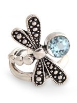 Blue topaz cocktail ring, 'Creature of Change' - Unique Blue Topaz and Sterling Silver Cocktail Ring