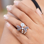 Blue topaz cocktail ring, 'Creature of Change' - Unique Blue Topaz and Sterling Silver Cocktail Ring