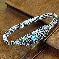 Blue topaz and peridot braided bracelet, 'Bamboo Blossoms' - Multi-Gemstone Sterling Silver Braclet