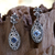 Blue topaz dangle earrings, 'Jungle Kingdom' - Blue Topaz and Sterling Silver Dangle Earrings thumbail