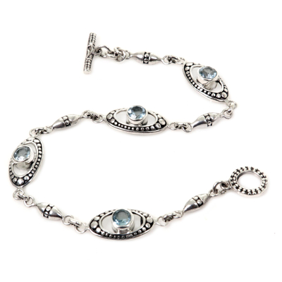 Blue topaz link bracelet, 'Reflections in Blue' - Sterling Silver and Blue Topaz Link Bracelet