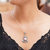 Cultured pearl and blue topaz floral necklace, 'Pink Frangipani Trio' - Unique Pearl and Blue Topaz Pendant Necklace (image 2i) thumbail