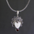 Garnet and moonstone pendant necklace, 'Princess Aura' - Garnet and Bone Silver Pendant Necklace (image 2) thumbail