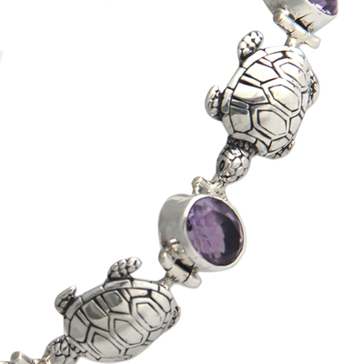 Amethyst link bracelet, 'Turtle Migration' - Balinese Silver Turtle Theme Handcrafted Amethyst Bracelet