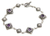 Amethyst link bracelet, 'Dream Garden' - Hand Crafted Sterling Silver and Amethyst Link Bracelet