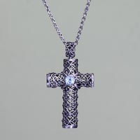 Blue topaz pendant necklace, 'Jasmine Cross' - Sterling Silver Filigree Cross with Blue Topac from Bali