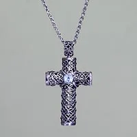 Blue topaz pendant necklace, 'Jasmine Cross' - Sterling Silver Filigree Cross with Blue Topac from Bali