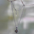 Peridot and citrine pendant necklace, 'Jasmine Shield' - Peridot and citrine pendant necklace