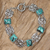 Sterling silver link bracelet, 'Majapahit Flowers' - Handcrafted Balinese Silver and Turquoise Bracelet