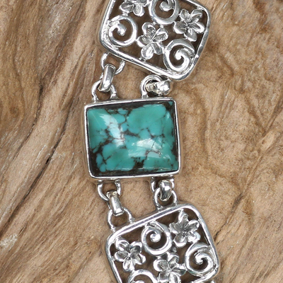 Sterling silver link bracelet, 'Majapahit Flowers' - Handcrafted Balinese Silver and Turquoise Bracelet