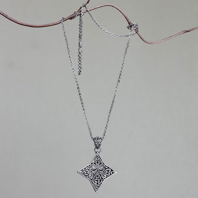 Sterling silver pendant necklace, 'Star of Bali' - Balinese Floral Star Handmade Silver Necklace