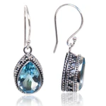 Blue topaz dangle earrings, 'Sparkling Dew' - Handcrafted Blue Topaz and Sterling Silver Earrings