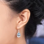 Blue topaz dangle earrings, 'Sparkling Dew' - Handcrafted Blue Topaz and Sterling Silver Earrings