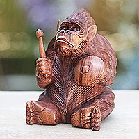 Wood statuette, 'Orangutan Plays the Kempur' - Artisan Crafted Orangutan Wood Statuette 