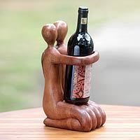 Wood wine bottle holder, 'Gift of Love' - Balinese Hand Carved Romantic Wine Bottle Holder