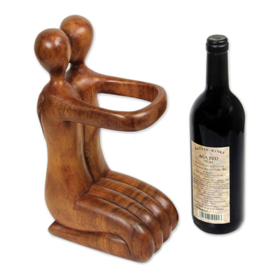 Wood wine bottle holder, 'Gift of Love' - Balinese Hand Carved Romantic Wine Bottle Holder