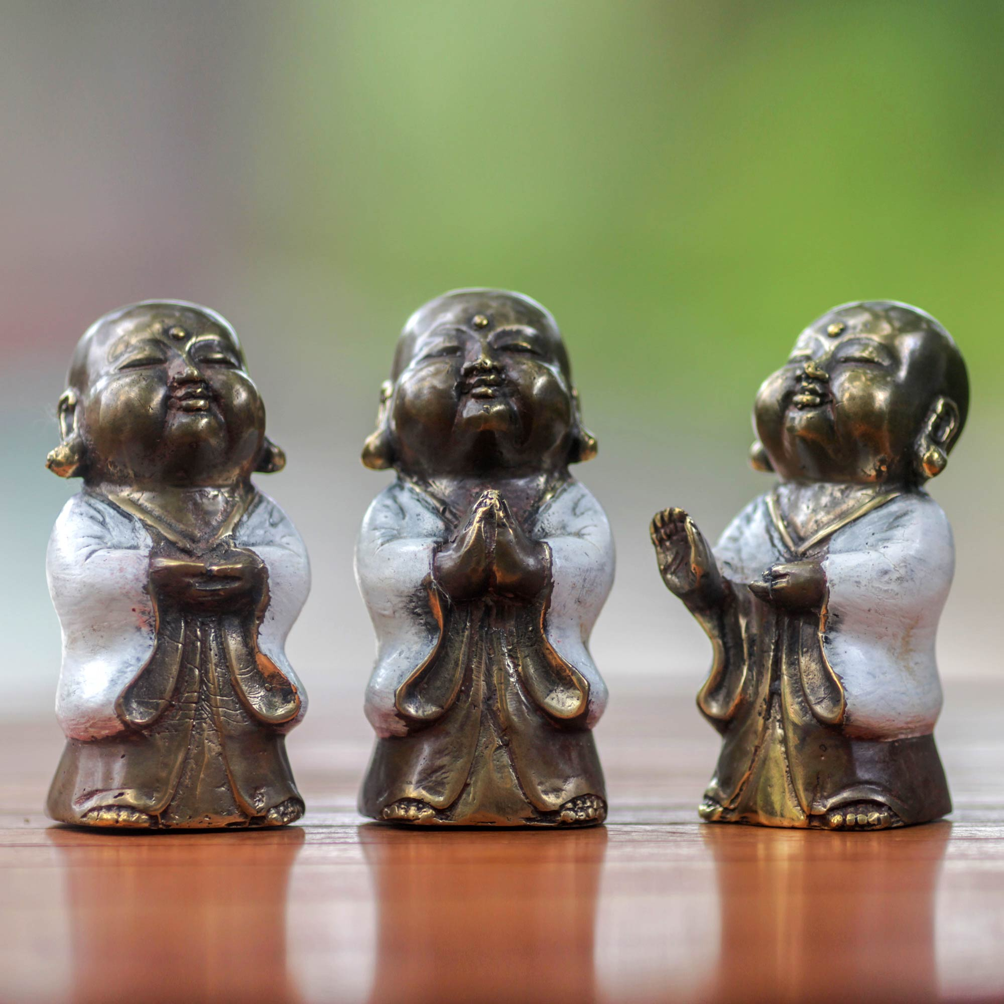 Three Antique Style Bronze Buddha Images from Bali - Little Buddha in White  | NOVICA