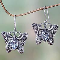 Blue topaz dangle earrings, 'Enchanted Butterfly' - Handcrafted Indonesian Silver and Blue Topaz Earrings