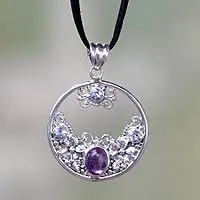 Blue topaz and amethyst pendant necklace, 'Floral Moon'