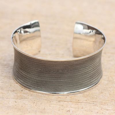 Sterling silver cuff bracelet, 'Infinity Braid' - Wide Concave Silver Cuff Bracelet