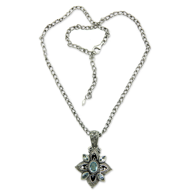 Blue topaz flower necklace, 'Jasmine Shield' - Floral Sterling Silver Necklace with Blue Topaz 2.5 cts