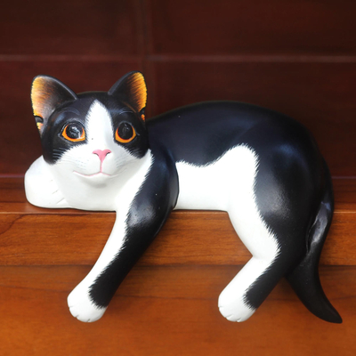 Wood sculpture, Tuxedo Cat Relaxes