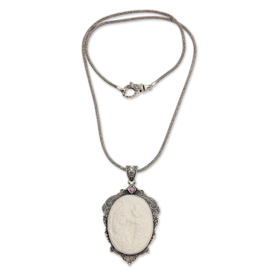 Bone and amethyst pendant necklace, 'Two Lucky Dragon Fish' - Amethyst Necklace with Carved Bone Medallion